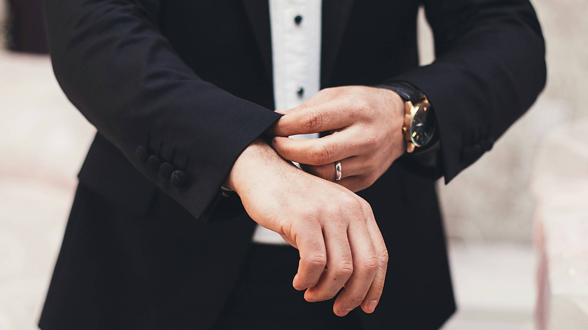 man in black suit